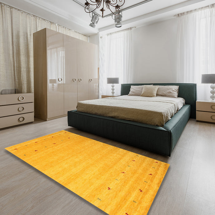 Machine Washable Contemporary Deep Yellow Rug in a Bedroom, wshcon923