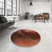 Round Patterned Red Rug in a Office, pat101org