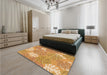 Patterned Yellow Orange Rug in a Bedroom, pat1014org