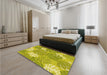 Patterned Dark Yellow Green Rug in a Bedroom, pat1016yw