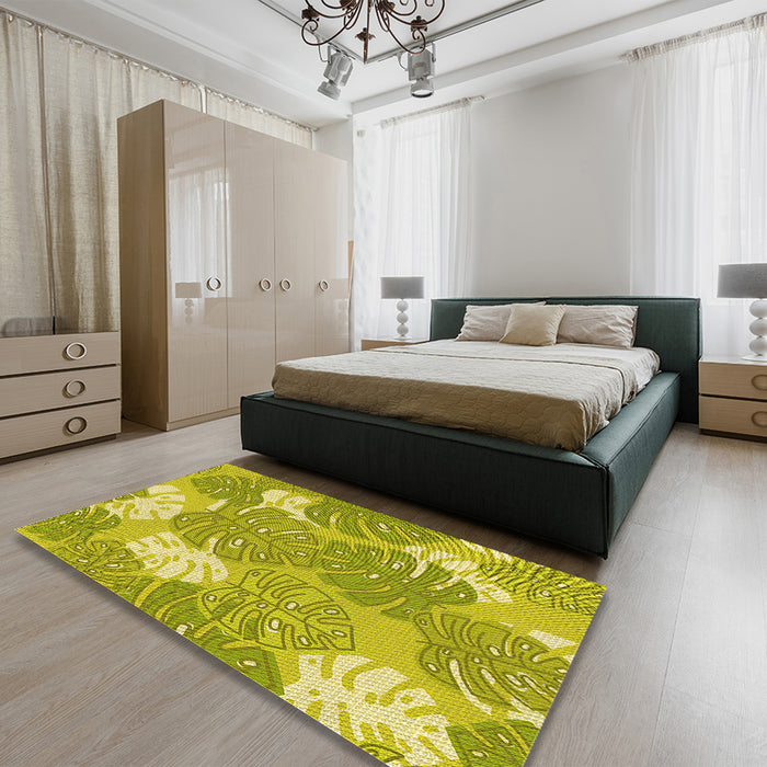Patterned Dark Yellow Green Rug in a Bedroom, pat1016yw