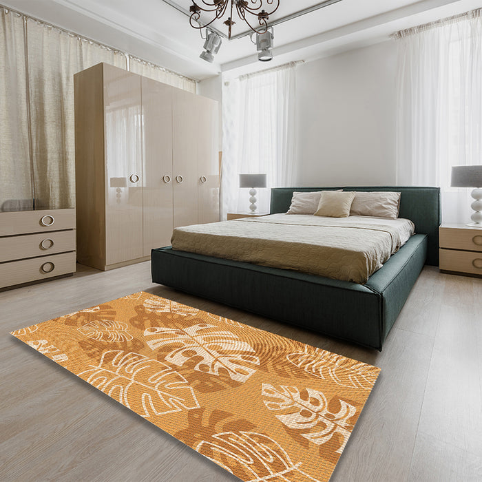 Patterned Yellow Orange Rug in a Bedroom, pat1017org