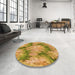 Round Patterned Yellow Rug in a Office, pat102org