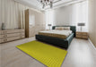 Patterned Dark Yellow Green Rug in a Bedroom, pat1024yw