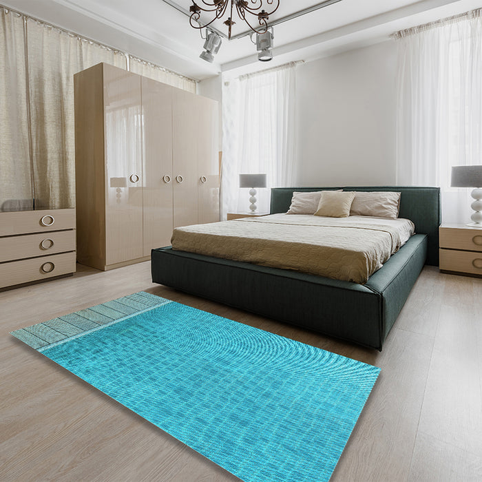 Patterned Bright Cyan Blue Rug in a Bedroom, pat1030lblu
