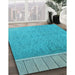 Patterned Bright Cyan Blue Rug in Family Room, pat1030lblu