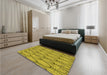 Patterned Dark Yellow Green Rug in a Bedroom, pat1054yw