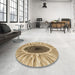 Round Patterned Yellow Rug in a Office, pat1055brn