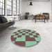Round Patterned Medium Aqua Marine Green Rug in a Office, pat1115lblu