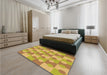 Patterned Golden Brown Yellow Rug in a Bedroom, pat1123org