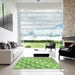 Square Patterned Green Rug in a Living Room, pat1130grn