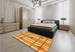 Patterned Bright Gold Yellow Rug in a Bedroom, pat1140yw