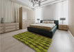 Patterned Dark Yellow Green Rug in a Bedroom, pat1207org