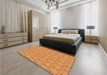 Patterned Neon Orange Rug in a Bedroom, pat1271org