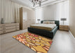 Patterned Yellow Orange Rug in a Bedroom, pat1316org