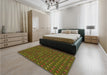 Patterned Dark Yellow Green Rug in a Bedroom, pat1323org