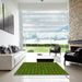 Square Patterned Dark Lime Green Rug in a Living Room, pat1323yw