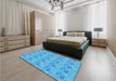 Patterned Bright Turquoise Blue Rug in a Bedroom, pat1329lblu