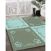 Patterned Camouflage Green Rug in Family Room, pat1413lblu