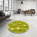 Round Patterned Dark Yellow Green Rug in a Office, pat1423yw