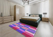 Patterned Medium Violet Red Pink Rug in a Bedroom, pat1430pur