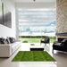 Square Patterned Dark Lime Green Rug in a Living Room, pat1458yw