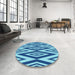 Round Patterned Blue Rug in a Office, pat1496lblu