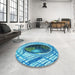 Round Patterned Blue Rug in a Office, pat1568lblu