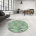 Round Patterned Blue Green Rug in a Office, pat1572lblu