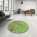 Round Patterned Yellow Green Rug in a Office, pat1575lblu
