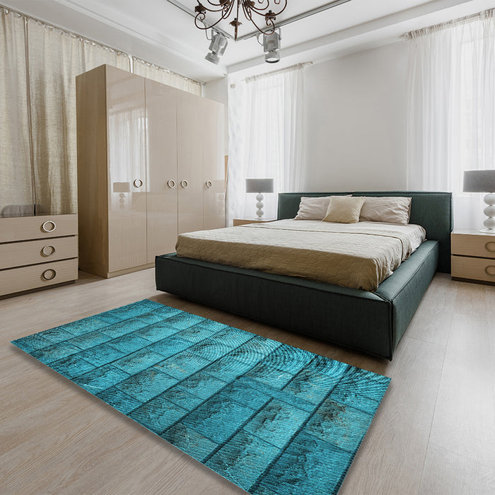 Patterned Dark Turquoise Green Rug in a Bedroom, pat1597lblu