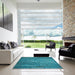 Square Patterned Dark Turquoise Green Rug in a Living Room, pat1597lblu