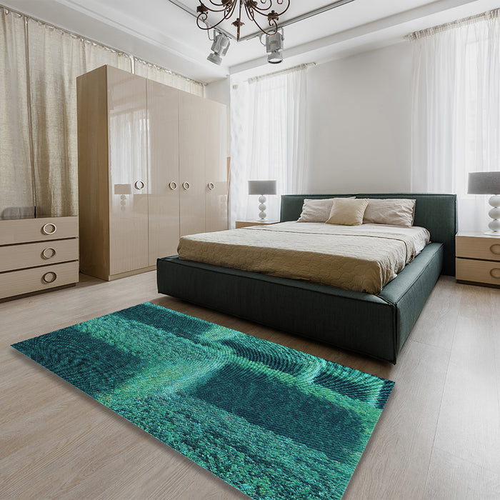 Patterned Medium Teal Green Rug in a Bedroom, pat1624lblu