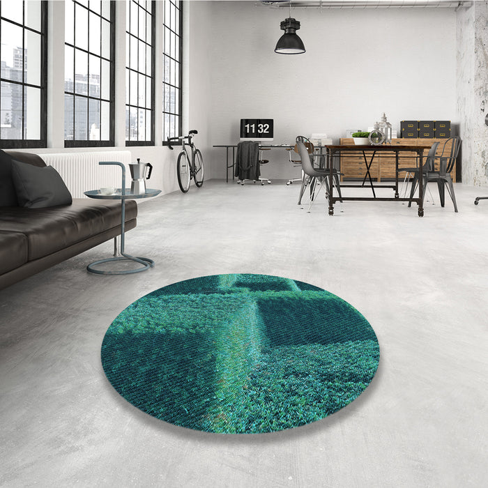 Round Patterned Medium Teal Green Rug in a Office, pat1624lblu
