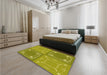 Patterned Dark Yellow Green Rug in a Bedroom, pat1632yw