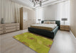 Patterned Dark Yellow Green Rug in a Bedroom, pat1640org