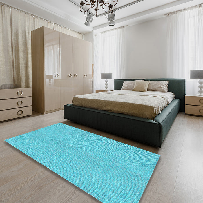 Patterned Bright Turquoise Blue Rug in a Bedroom, pat1652lblu