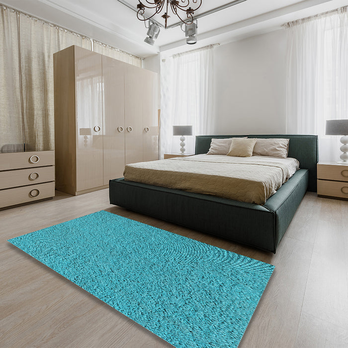 Patterned Bright Turquoise Blue Rug in a Bedroom, pat1654lblu