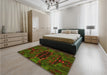 Patterned Red Rug in a Bedroom, pat168yw