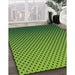 Patterned Green Abstract Machine Washable Rug in a Family Room, wshpat1682