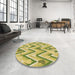 Round Patterned Dark Yellow Green Rug in a Office, pat1688brn