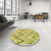 Round Patterned Bold Yellow Rug in a Office, pat1689brn