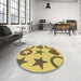 Round Patterned Yellow Rug in a Office, pat1692brn