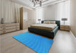 Patterned Neon Blue Rug in a Bedroom, pat1707lblu