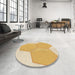 Round Patterned Yellow Rug in a Office, pat1708brn