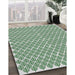 Patterned Green Abstract Machine Washable Rug in a Family Room, wshpat1789