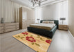 Patterned Yellow Orange Rug in a Bedroom, pat1797org