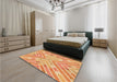 Patterned Yellow Orange Rug in a Bedroom, pat1834org