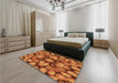 Patterned Neon Orange Rug in a Bedroom, pat186org