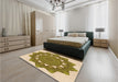 Patterned Dark Yellow Green Rug in a Bedroom, pat1895org